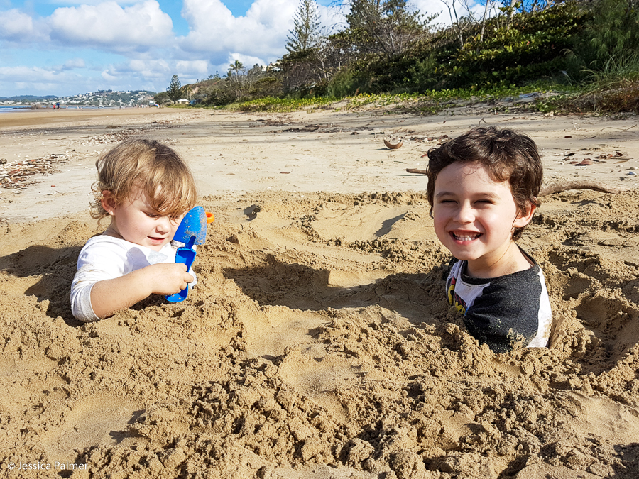 Having fun in the sand at low tide in Yeppoon.